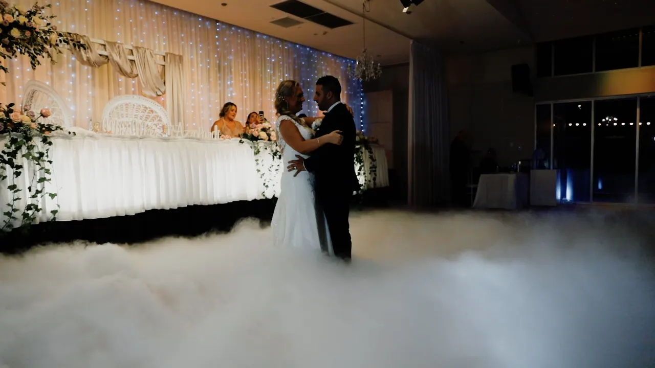 Renee & Simon at City Beach Wollongong, wedding film frame 30