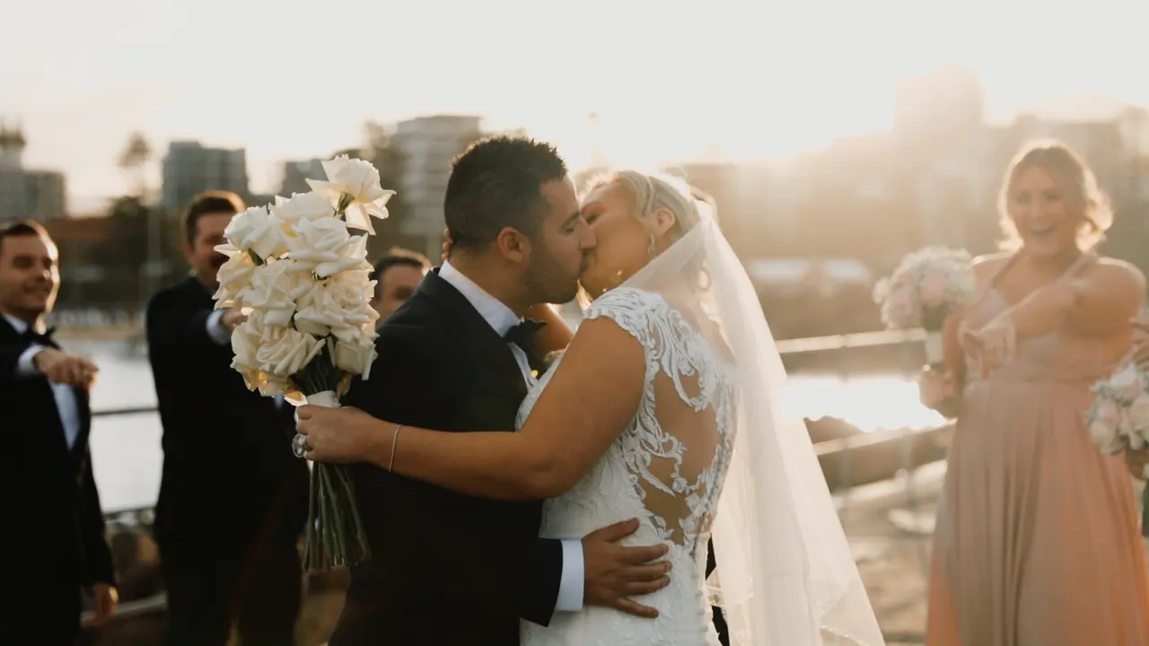 Renee & Simon at City Beach Wollongong, wedding film frame 4