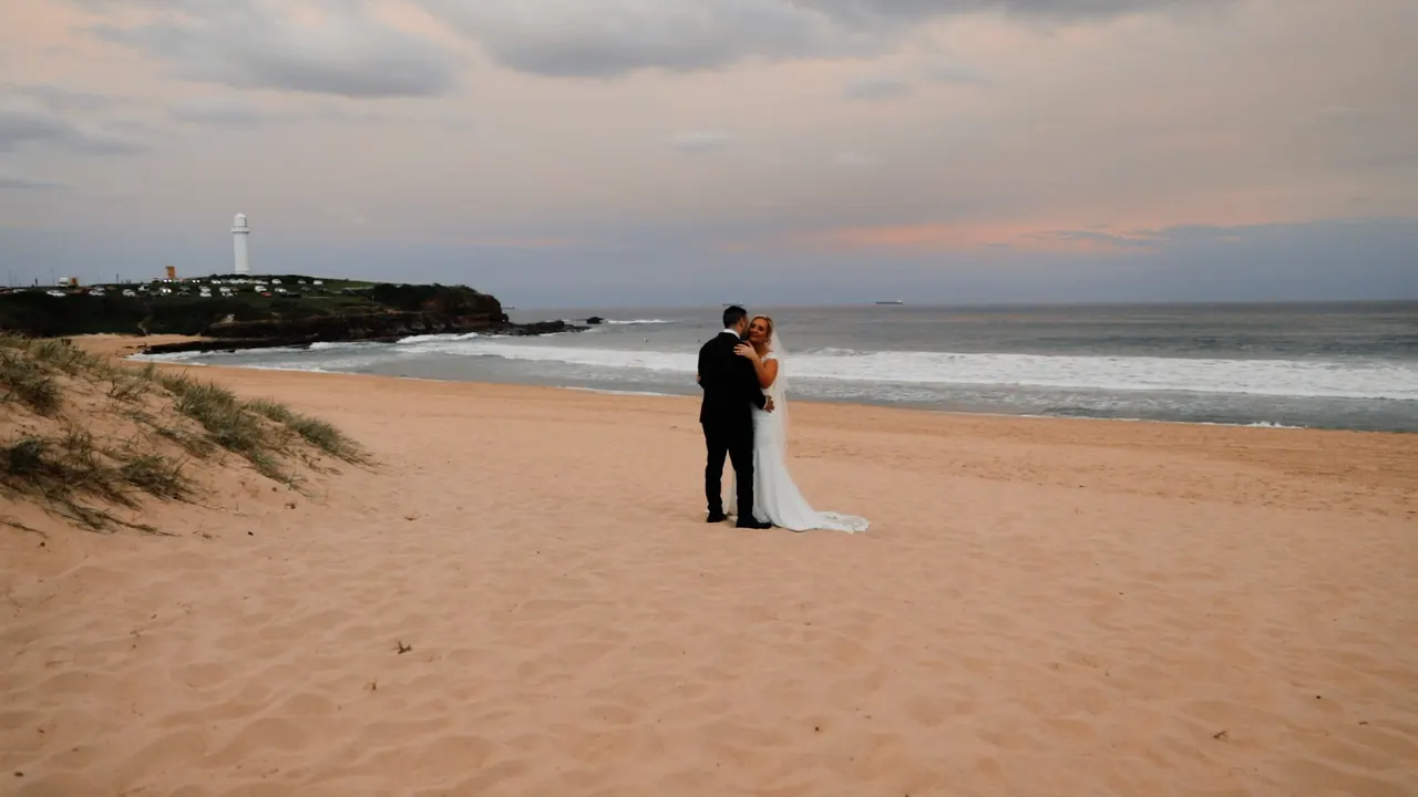 Renee & Simon at City Beach Wollongong, wedding film frame 20