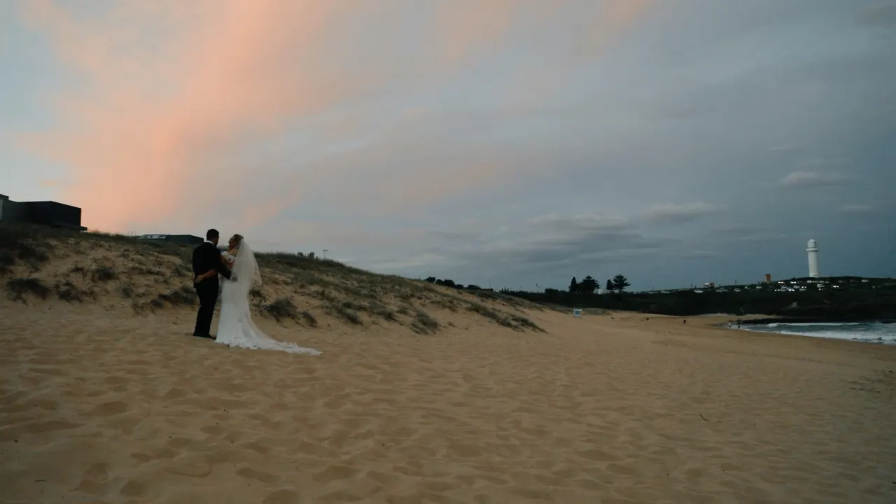 Renee & Simon at City Beach Wollongong, wedding film frame 19
