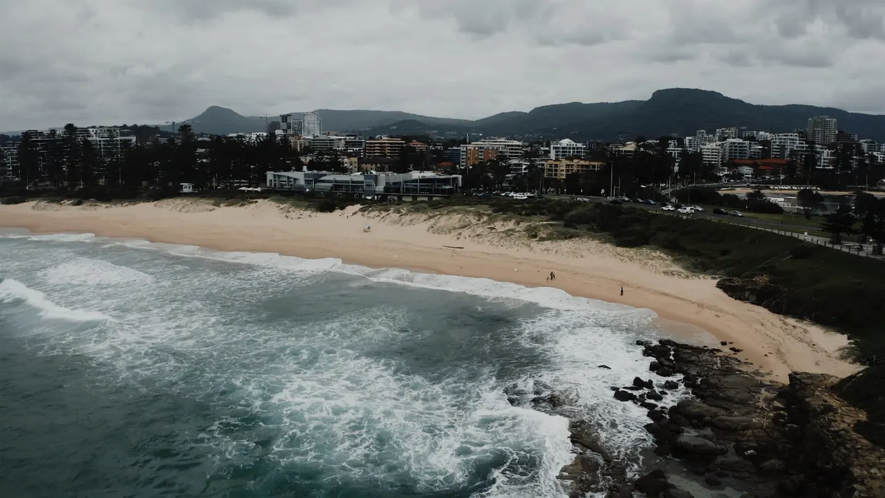 Renee & Simon at City Beach Wollongong, wedding film frame 7